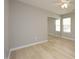 Bedroom featuring a ceiling fan, neutral paint, and ample natural light for comfortable living at 5526 Spindlewood Ct, Durham, NC 27703