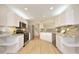 Modern kitchen featuring stainless steel appliances and granite countertops at 5526 Spindlewood Ct, Durham, NC 27703