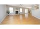Bright living room with wood floors, fireplace, and abundant natural light at 5526 Spindlewood Ct, Durham, NC 27703