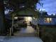 Backyard deck with a hammock and outdoor seating, perfect for relaxation at 5636 Thom Rd, Mebane, NC 27302