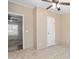 Bedroom showing the doorway, a ceiling fan and standard electric outlets at 5636 Thom Rd, Mebane, NC 27302