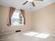 Bedroom with natural light from the window and standard electric outlets at 5636 Thom Rd, Mebane, NC 27302