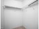 Empty walk-in closet showcasing a white interior and wire shelving at 5636 Thom Rd, Mebane, NC 27302