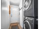 Functional laundry room with a stackable washer and dryer at 5636 Thom Rd, Mebane, NC 27302