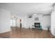 Bright and airy living room with a fireplace, ample natural light, and wood flooring at 5636 Thom Rd, Mebane, NC 27302