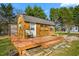 A newly built shed offers outdoor storage and a charming deck at 5636 Thom Rd, Mebane, NC 27302
