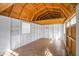 Clean shed interior with wooden floor, shelves and window offering great storage at 5636 Thom Rd, Mebane, NC 27302