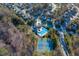 The overhead photo displays community amenities featuring a pool, tennis courts, and beautiful surrounding neighborhoods at 5812 Solitude Way, Durham, NC 27713