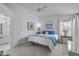 Bright bedroom with a ceiling fan, carpet and comfortable queen-sized bed at 5812 Solitude Way, Durham, NC 27713