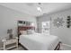 Comfortable bedroom with a ceiling fan, nice light, and tasteful decor at 5812 Solitude Way, Durham, NC 27713