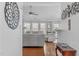 Spacious living room boasts hardwood floors, white walls, and plenty of natural light at 5812 Solitude Way, Durham, NC 27713