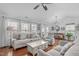 Spacious living room features hardwood floors, neutral decor, and ample seating at 5812 Solitude Way, Durham, NC 27713