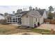 Backyard shed next to the screened-in porch and fire pit area at 5812 Solitude Way, Durham, NC 27713