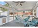 Bright and airy sunroom with a seating area, ceiling fan, and view of the outdoors at 5812 Solitude Way, Durham, NC 27713