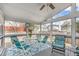 Relaxing sunroom with plenty of natural light, a ceiling fan, and room to entertain at 5812 Solitude Way, Durham, NC 27713