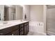 Bathroom with double vanity, soaking tub, and a separate shower is perfect for relaxation at 59 Peduncle St, Selma, NC 27576