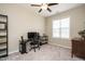 Neutral bedroom with a ceiling fan, a computer desk, and plush carpet at 59 Peduncle St, Selma, NC 27576