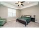Spacious bedroom offers a ceiling fan, neutral walls, and a large window for ample natural light at 59 Peduncle St, Selma, NC 27576