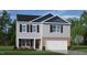 Charming two-story home with brick and gray siding, front lawn and attached two-car garage at 6028 Sodium St, Raleigh, NC 27610