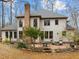 Inviting backyard showcasing a brick patio perfect for outdoor dining and relaxation at 6106 Bent Oak Dr, Durham, NC 27705