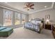 Spacious primary bedroom with natural light and a sitting area at 6106 Bent Oak Dr, Durham, NC 27705