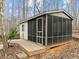 Charming outbuilding featuring a screened-in porch and deck, perfect for relaxation at 6106 Bent Oak Dr, Durham, NC 27705