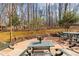 Outdoor patio featuring dining and lounge furniture with the serene backyard at 6106 Bent Oak Dr, Durham, NC 27705