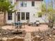 Cozy patio area with comfortable seating, a dining table, and a charming bird bath at 6106 Bent Oak Dr, Durham, NC 27705