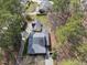 Birds eye view of this house, nestled amongst the trees on a generous, private lot at 6301 King Lawrence Rd, Raleigh, NC 27607