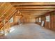 Spacious unfinished attic area shows potential for conversion into living space at 6301 King Lawrence Rd, Raleigh, NC 27607