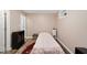 Finished basement bedroom with cozy decor, window, and closet at 6301 King Lawrence Rd, Raleigh, NC 27607