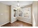 Bright breakfast nook featuring three windows and a ceiling fan at 6301 King Lawrence Rd, Raleigh, NC 27607