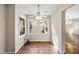 Cozy breakfast nook with bright windows and wood flooring at 6301 King Lawrence Rd, Raleigh, NC 27607