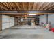 Unfinished garage is large and open, with space for parking and storage at 6301 King Lawrence Rd, Raleigh, NC 27607