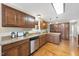 Well-appointed kitchen features stainless steel appliances, granite countertops, and ample cabinet space at 6301 King Lawrence Rd, Raleigh, NC 27607