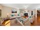 Cozy living room features a fireplace, hardwood floors, and comfortable seating, creating a welcoming atmosphere at 6301 King Lawrence Rd, Raleigh, NC 27607