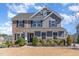Attractive two-story home featuring stone accents, neutral siding, and well-maintained landscaping at 710 Legacy Falls S S Dr, Chapel Hill, NC 27517