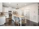 Bright kitchen with granite countertops, stainless steel appliances, and a center island with seating at 710 Legacy Falls S S Dr, Chapel Hill, NC 27517