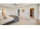 Spacious main bedroom with a tray ceiling, walk-in closet, and neutral decor at 710 Legacy Falls S S Dr, Chapel Hill, NC 27517