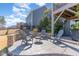 Outdoor patio with a fire pit, seating area, and lovely landscaping, ideal for entertaining or relaxation at 710 Legacy Falls S S Dr, Chapel Hill, NC 27517
