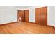 The bedroom offers hardwood floors and ample closet space, combining comfort and practicality for everyday living at 7415 Old Oxford Rd, Bahama, NC 27503