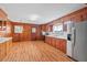 Large kitchen featuring wood cabinets, stainless steel appliances and ample counter space at 7415 Old Oxford Rd, Bahama, NC 27503