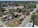Charming neighborhood with a mix of home styles, mature trees and well maintained streets from an aerial perspective at 805 S 11Th St, Lillington, NC 27546