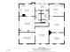 Detailed floor plan showcasing the layout of the first floor, including the kitchen, dining room, and bedrooms at 805 S 11Th St, Lillington, NC 27546