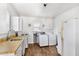 Utility room with washer, dryer, and sink at 805 S 11Th St, Lillington, NC 27546