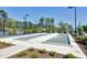 Community bocce ball courts with sidewalks, shade, and seating, for residents to enjoy at 823 Atticus Way, Durham, NC 27703