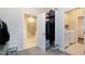 Hallway with a view to the bathroom and laundry room at 823 Atticus Way, Durham, NC 27703