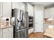 The kitchen features stainless steel appliances including a built-in microwave and oven combo at 823 Atticus Way, Durham, NC 27703