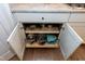 A kitchen cabinet contains pull out shelves, providing easy access to cookware at 823 Atticus Way, Durham, NC 27703