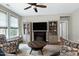 A comfortable living room shows neutral colors and a ceiling fan at 823 Atticus Way, Durham, NC 27703
